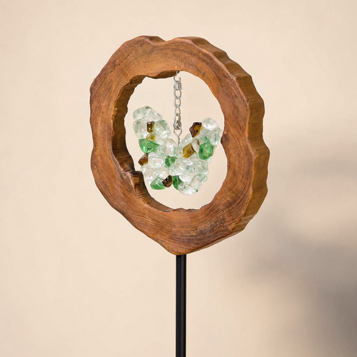 One Mirthwick glass butterfly garden stake shown clearly against a warm ivory background